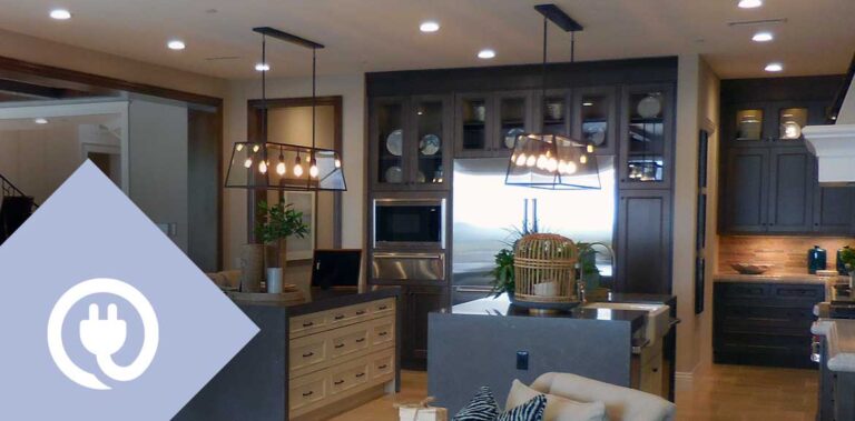 Professionally lit kitchen with modern electrical systems
